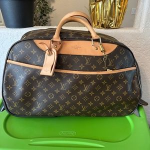 Louis Vuitton Eole Monogram Rolling bag